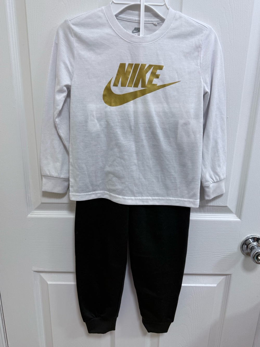 Kids’ Nike White Long Sleeve Tee with Gold Logo and Black Joggers, Size 5